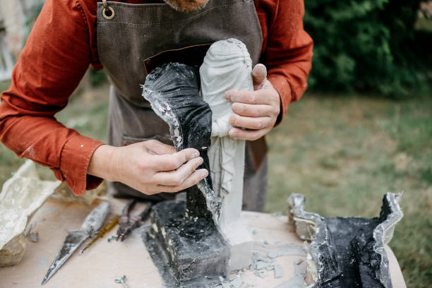 istock Stonemason carves a sculpture 2170670180