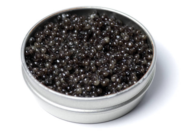 istock Black sturgeon caviar. Sturgeon caviar on a white background in a jar. 2170681487