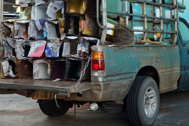 istock A many rusty tin boxs can on the trucks. 2170681533