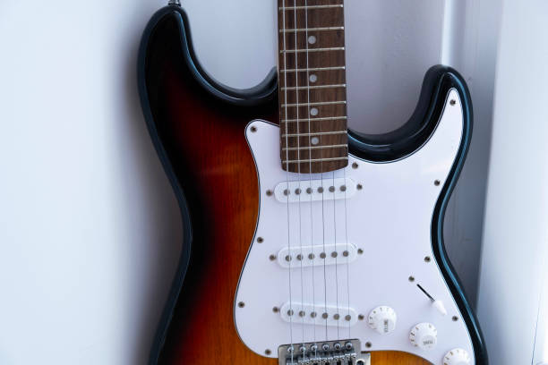 istock bass guitar brown and white 2170682228