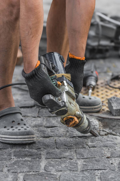 istock Industrial tool for repairing paving stones on the sidewalk 2170683370