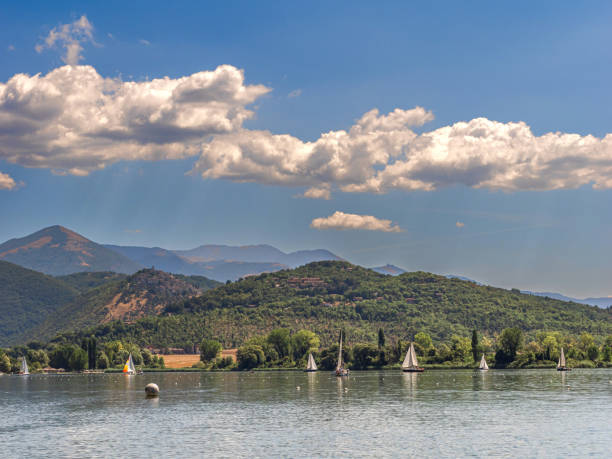 Beautiful nature background with a lake of Segrino in North of Italy, in Lombardy and Italian Alps mountains. Clean clear blue sky.