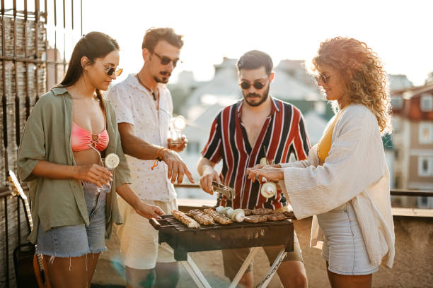 istock Group of people at a rooftop party 2170684692
