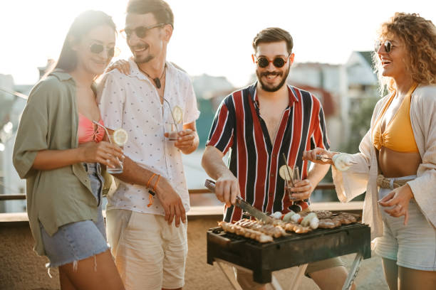 istock Group of people at a rooftop party 2170684693