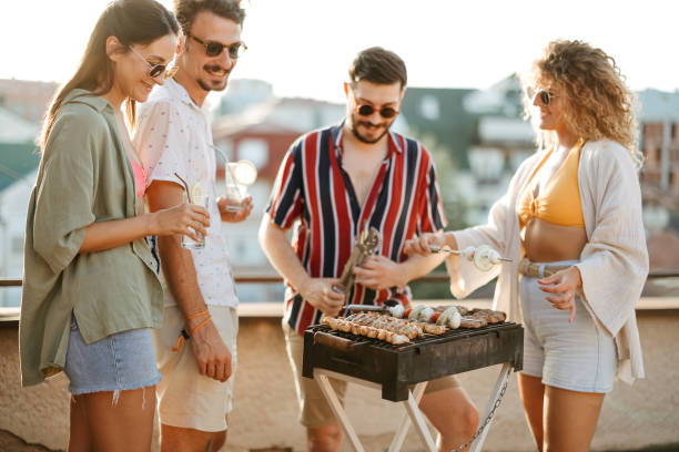 istock Group of people at a rooftop party 2170684701