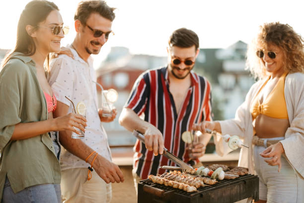 istock Group of people at a rooftop party 2170684704
