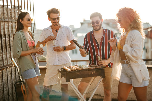 istock Group of people at a rooftop party 2170684715