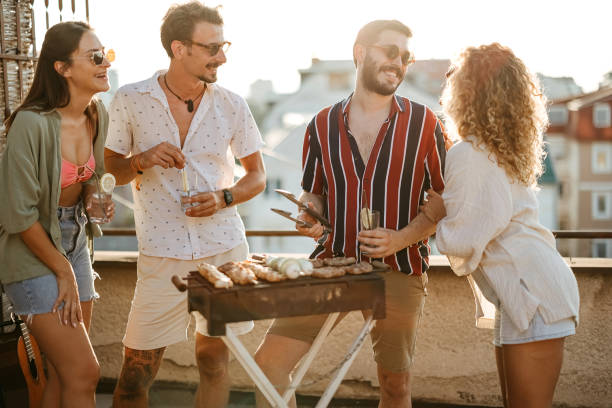 istock Group of people at a rooftop party 2170684719