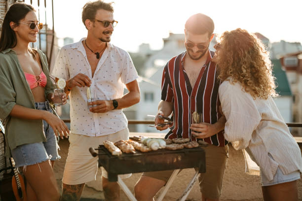 istock Group of people at a rooftop party 2170684720