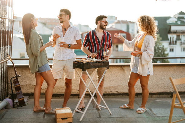 istock Group of people at a rooftop party 2170684722