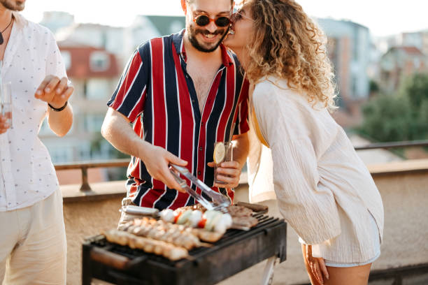 istock Group of people at a rooftop party 2170684723