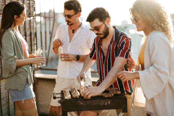 istock Group of people at a rooftop party 2170684724