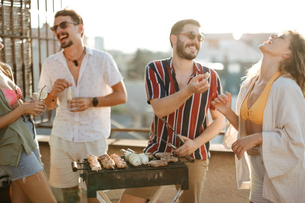 istock Group of people at a rooftop party 2170684744