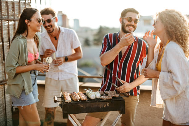 istock Group of people at a rooftop party 2170684748