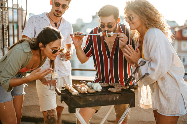 istock Group of people at a rooftop party 2170684750
