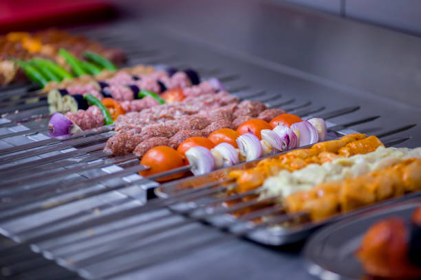Kebabs - grilled meat and vegetables on skewers. Seekh kabab