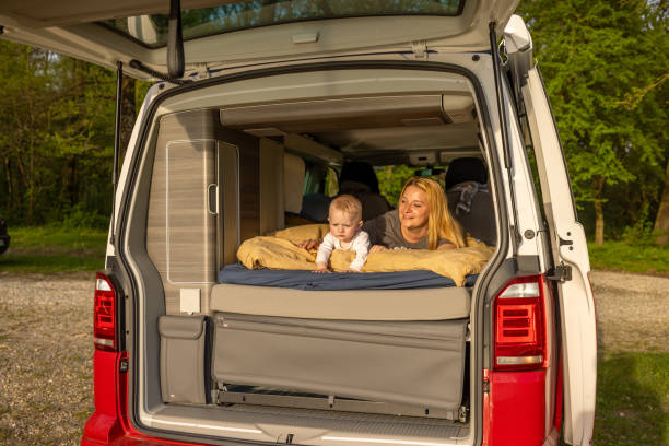istock Mother with Cute Son Relaxing in Motor Home 2170691544