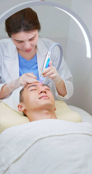 istock asian beautician use beauty tool 2170694645