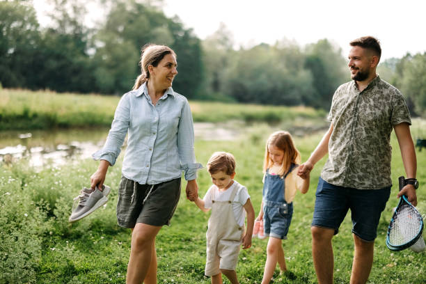 istock Family walks to the river 2170704856
