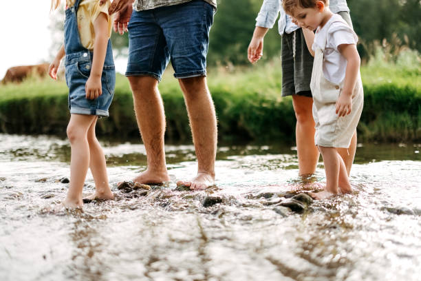 istock Family is walking along the river 2170704881