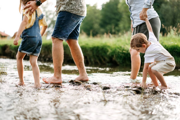 istock Family is walking along the river 2170704884