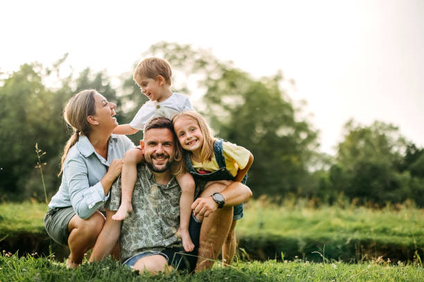Portrait of a happy family Portrait of a happy family in the forest good family stock pictures, royalty-free photos & images
