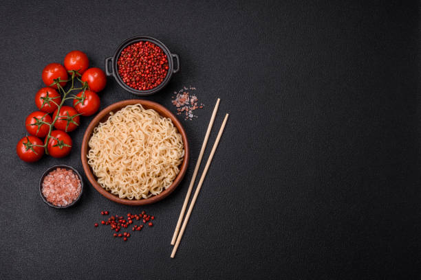 Rice noodles with mushrooms, vegetables, spices and herbs