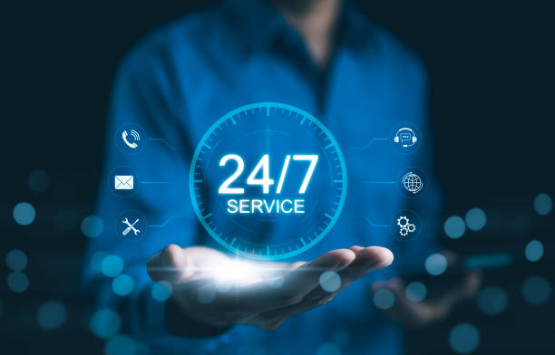 istock 24 hour 7 day customer service and support concept. Businessman presenting virtual icons for 24-7 customer service, phone, email, chat, technical support, assistance, communication, call center, 24 hr 2170713364