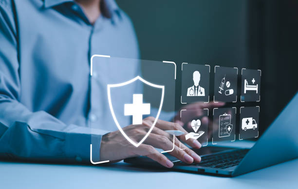 healthcare and medical technology. businessman use laptop with digital healthcare icons for medical records, insurance, patient care, pharmaceuticals, modern medical technology, health services, - bescherming fotos stockfoto's en -beelden
