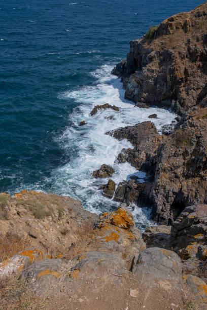istock Waves crashing into rocks in the ocean. 2170714619