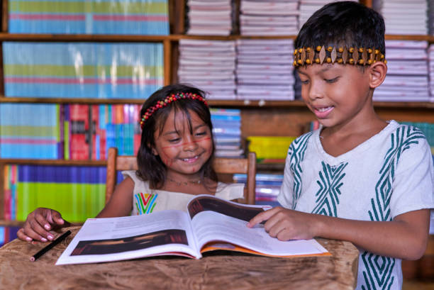 istock Two children from an indigenous community in Amazonas, Brazil, study in a library in their community 2170714807