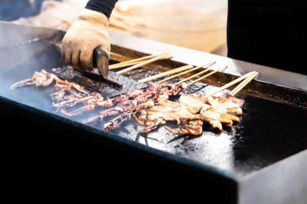 istock Fresh octopus grill cooking at a food stall 2170716170