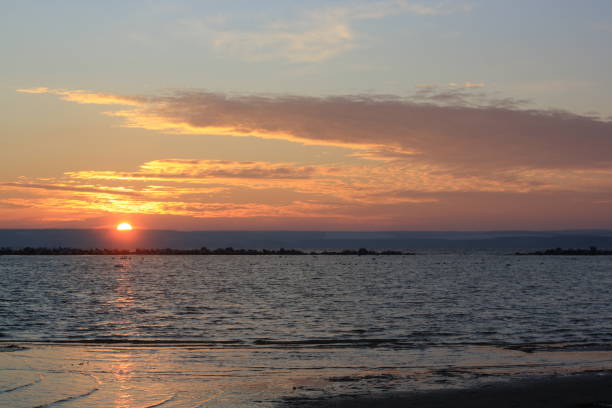 istock beautiful sunset on the beach 2170716447