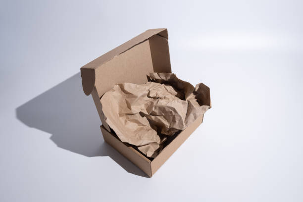 istock Brown paper box. Cardboard box isolated on white background. Place for text. Gift box 2170726189
