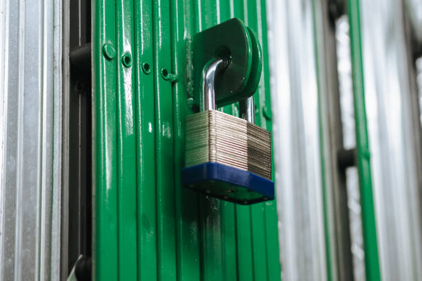istock padlock on the green door, 2170733321