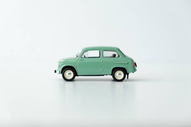 istock retro car, turquoise color isolated on a white background 2170734053