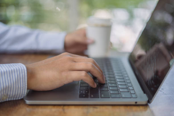 istock Businessman browsing internet on laptop and working on laptop computer in office, close up, cloud storage technology, business strategy analysis, internet of things 2170765897
