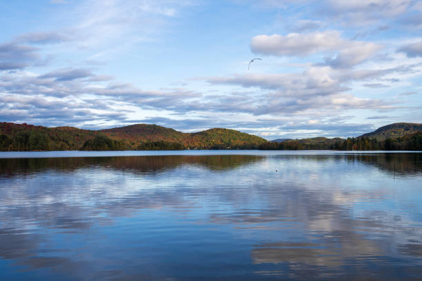 Lake Ouimet (Lac Ouimet) autumn scenery. Mont-Tremblant, Quebec, Canada.