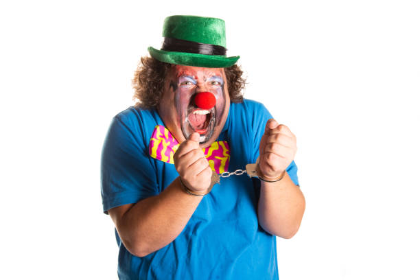 istock Evil clown from horror movies posing on a white background. 2170775475