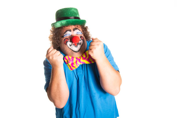 istock Funny fat clown posing on a white background. 2170775522