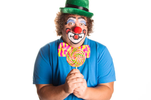 istock Funny fat clown posing on a white background. 2170775533