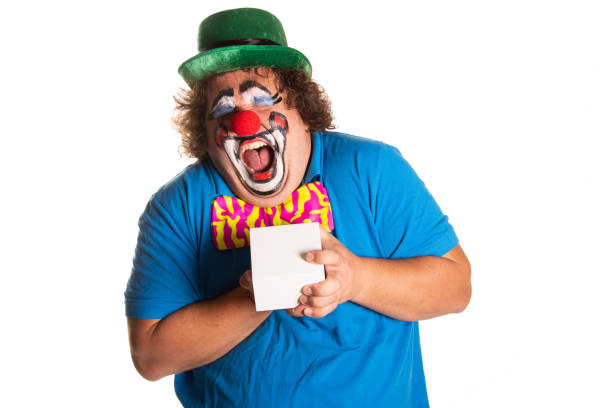 istock Funny fat clown posing on a white background. 2170775643