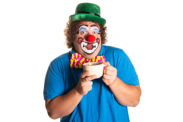 istock Funny fat clown posing on a white background. 2170775645