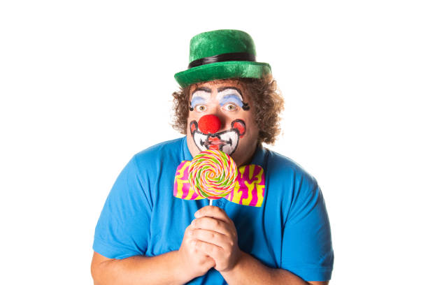 istock Funny fat clown posing on a white background. 2170775654