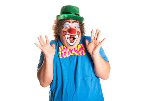 istock Funny fat clown posing on a white background. 2170775665