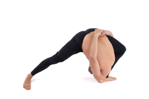istock A young attractive man warms up before bray dance. White background. 2170775940
