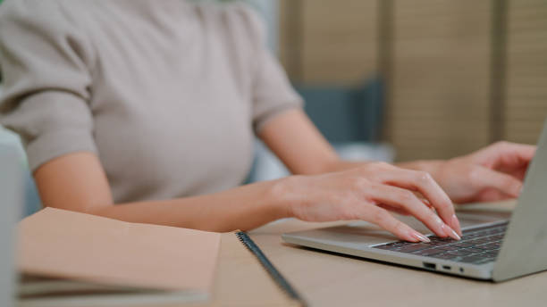 istock Asian businesswoman typing on laptop 2170777021