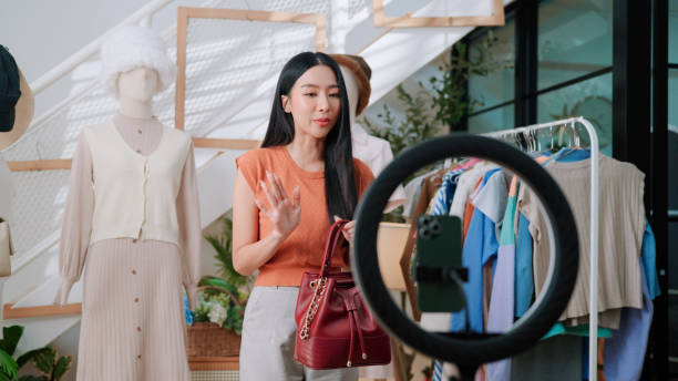 istock Asian woman doing live streaming on online platform 2170777782
