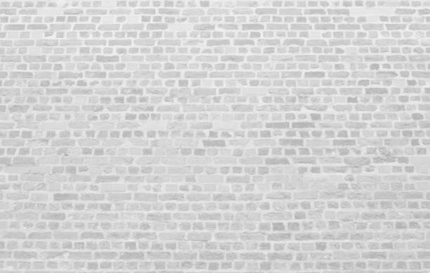 istock White grey old brick wall grunge retro texture background. 2170781302