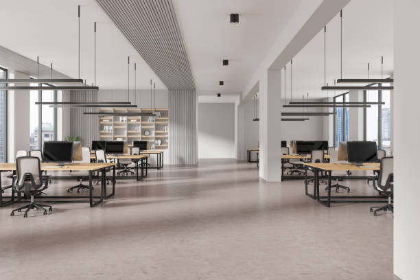 istock Office coworking interior with tables and pc desktop, panoramic window 2170782647